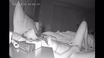 A Reserved Woman Indulges In Self-Pleasure Before Bed, Captured By A Concealed Camera